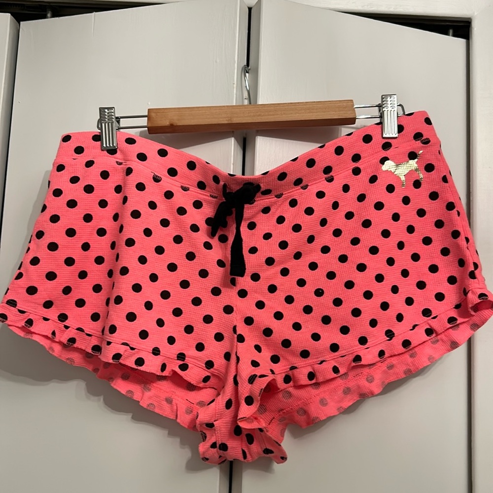 Pink ruffled sleep shorts in hot pink with black polka dots. Size Large
